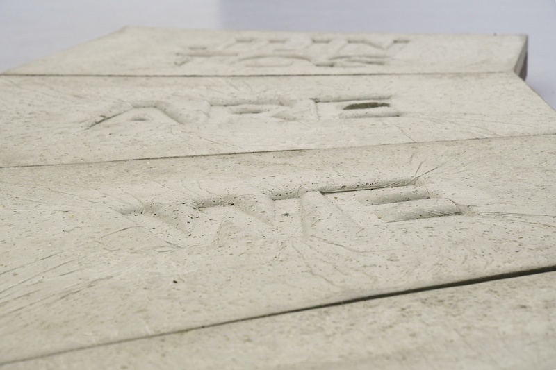 Iván Argote, Camino - Here We Are Juntos, 2019, Concrete, wood and steel, 9 x 217 x 110 cm Courtesy Perrotin