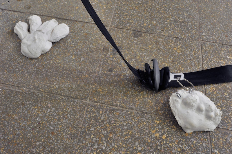 Veronika Olejárová: Fasten your seatbelts! Installation, detail, 2023. Fatboys, winding mechanism for car seatbelts, plaster object. Photo: Pavel Petrov, OGV Jihlava.